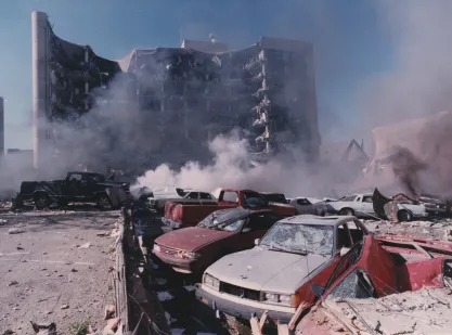 A photo of damaged vehicles in front of the Murrah Federal Building in Oklahoma City